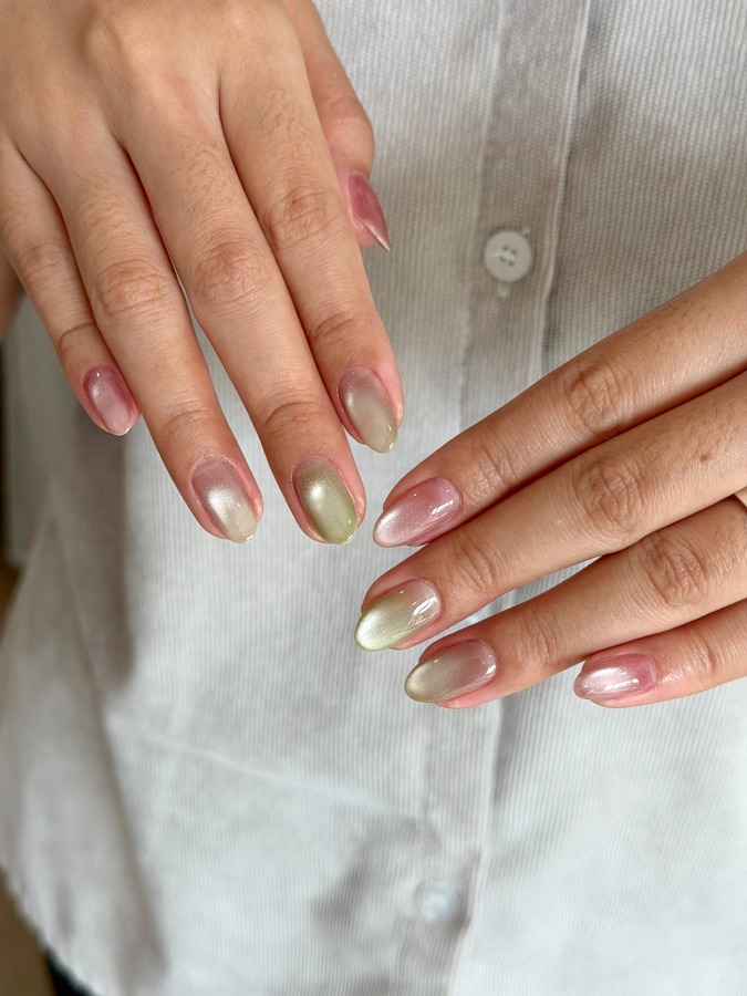 Nude almond nails with pearly chrome tips